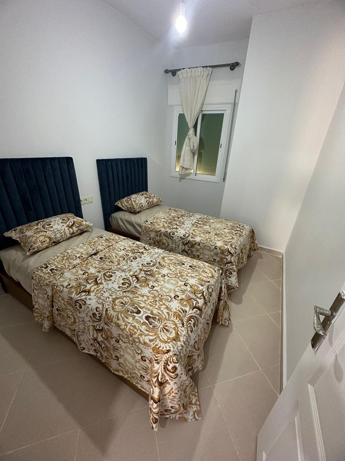Ojos Del Oceano Apartment Ksar es Sghir Bagian luar foto